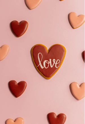 https://www.pexels.com/photo/small-hearts-with-love-word-placed-on-surface-5874579/